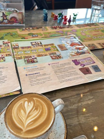 A board game and a latte